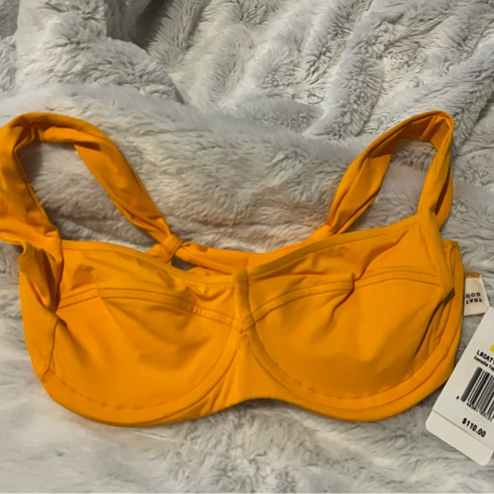 NWT - L* Space bikini top. Color is orange size small.
